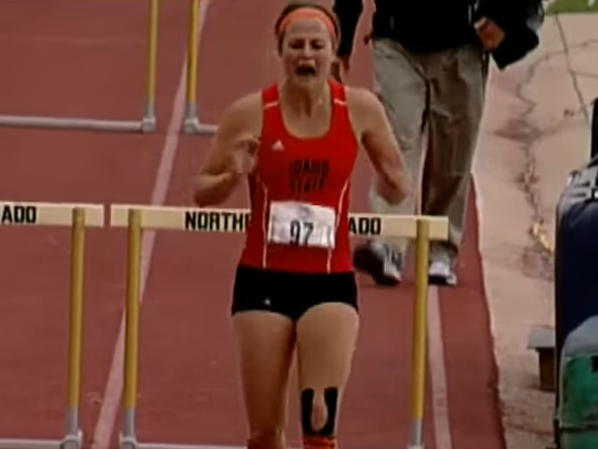 Shelby Erdahl finishes race with ruptured achilles.