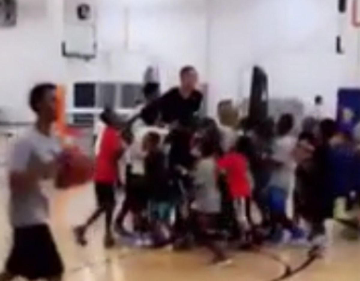 Aaron Gordon surrounded by campers.