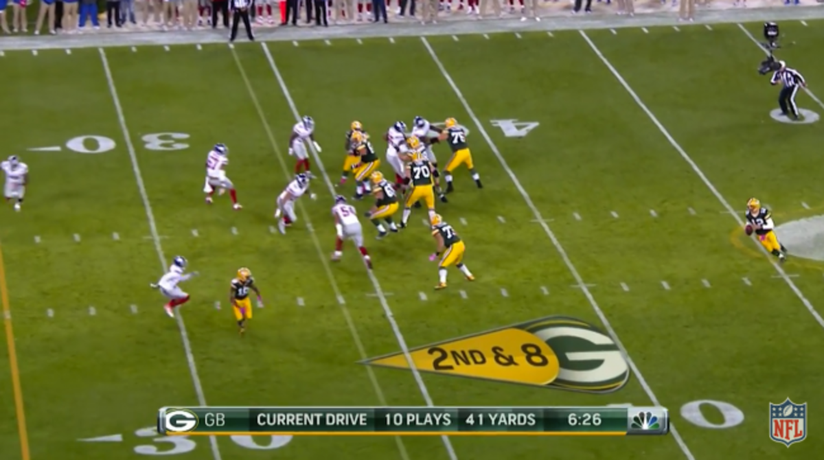 Aaron Rodgers dropping back for a pass against the Giants.