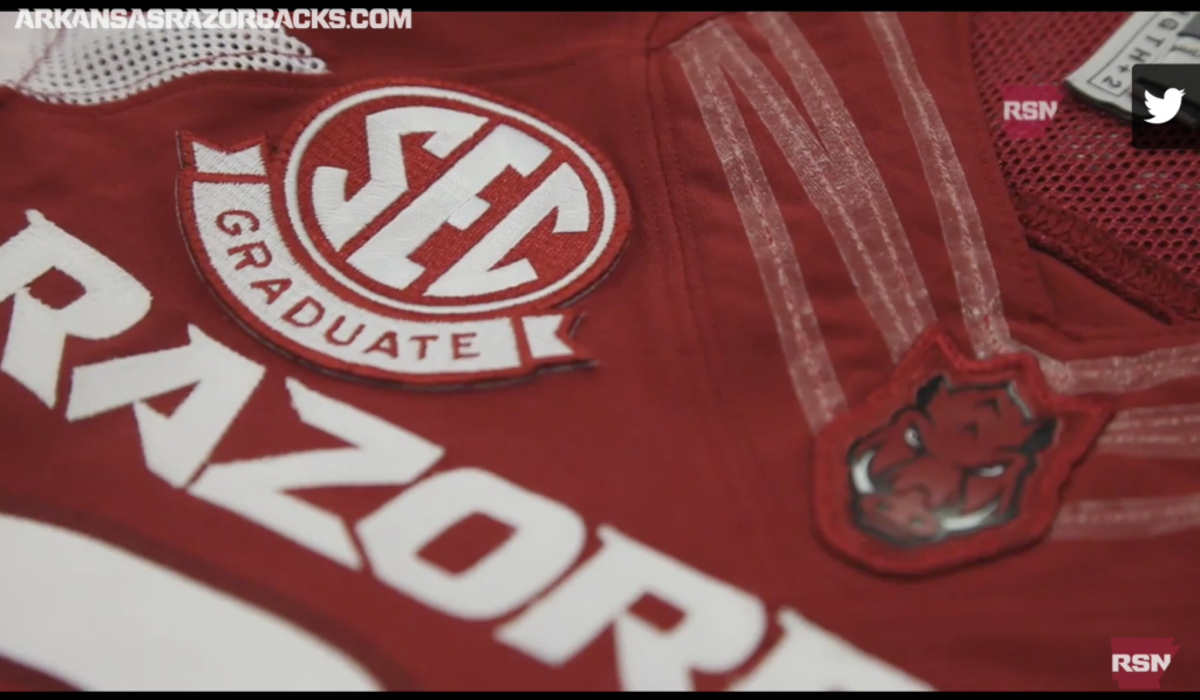 Arkansas "SEC Graduate" patch on a Razorbacks jersey.
