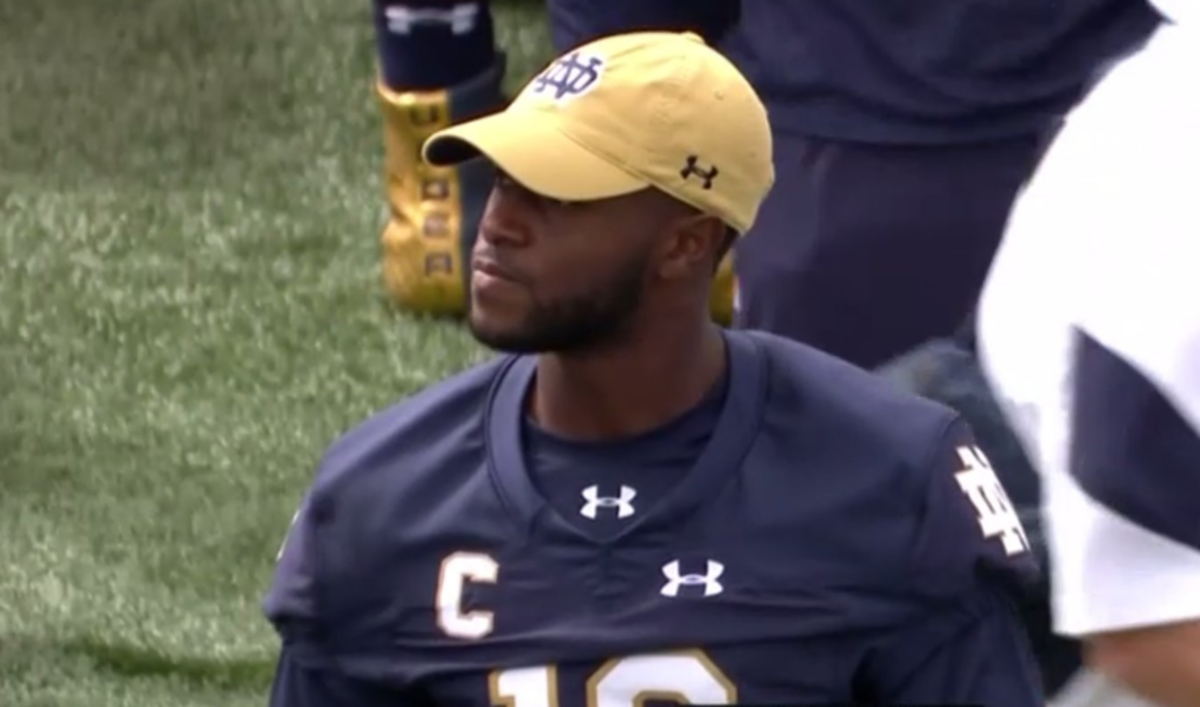Notre Dame WR Torii Hunter Jr wearing a hat on the sideline.