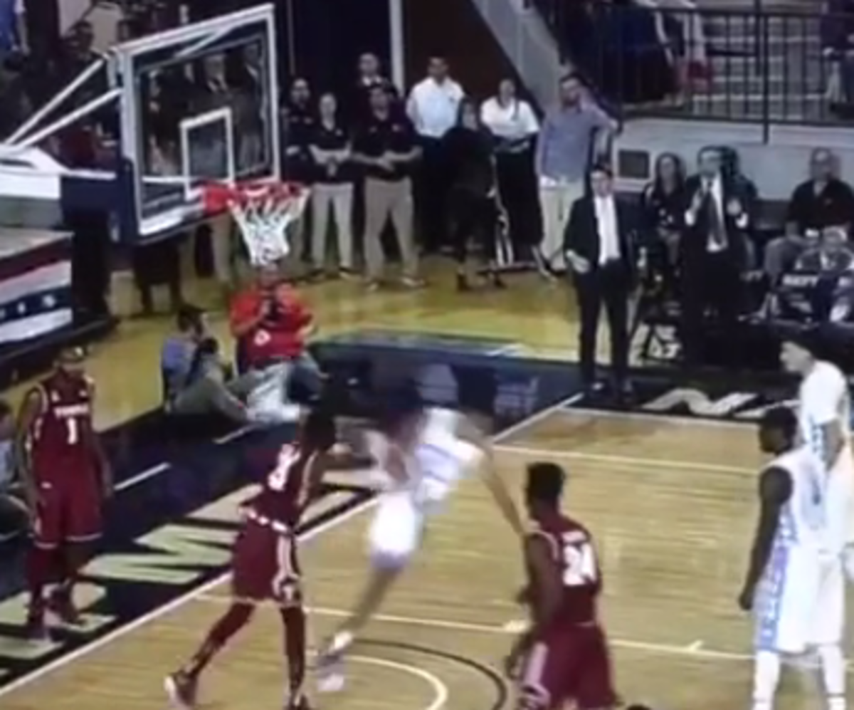 Temple player throws Brice Johnson to the ground.
