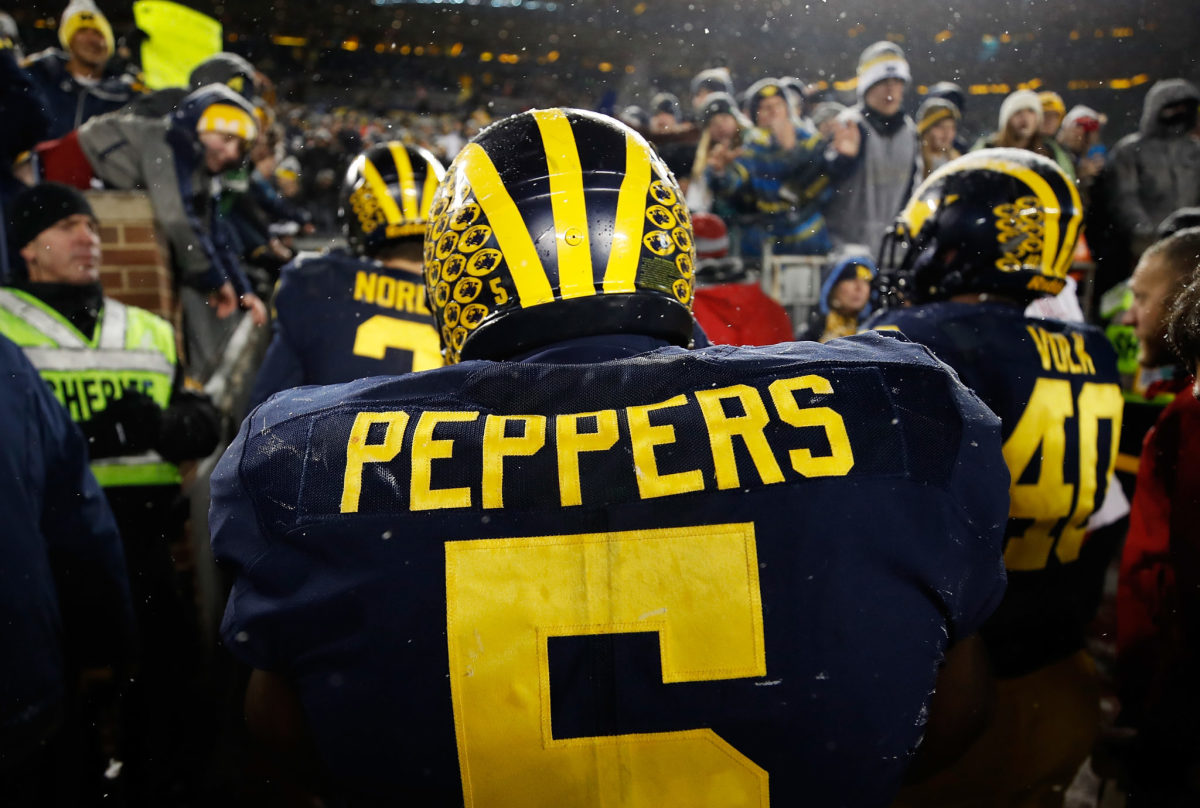 Jabrill Peppers walks off the field for Michigan.
