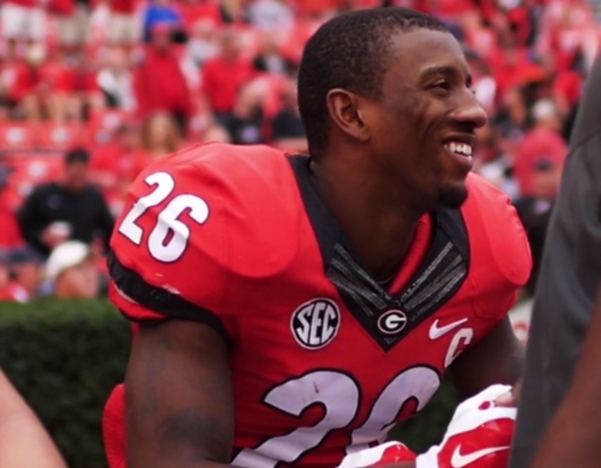 Georgia player on the teams sideline on game day.