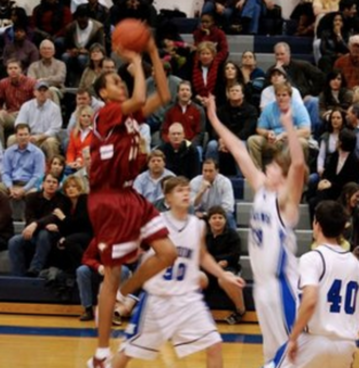 Skal Labissiere floats a layup during a high school game.