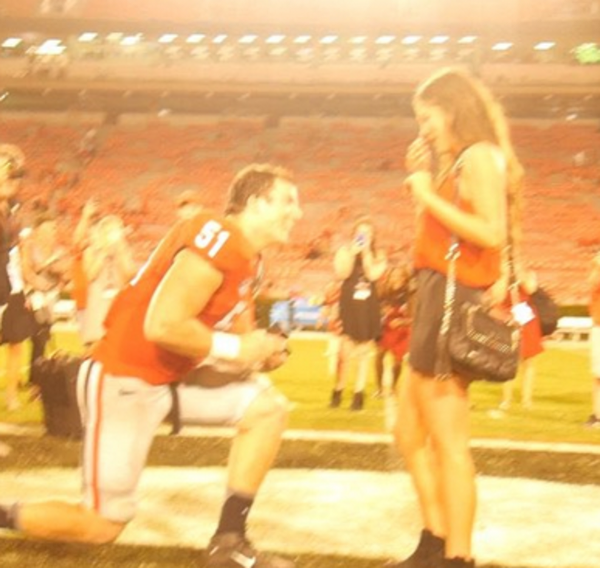 Jake Ganus proposes to his girlfriend after the Georgia football game.
