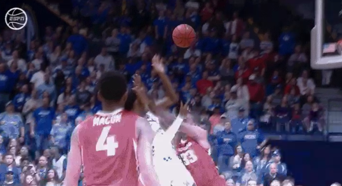 Arkansas basketball player gets fouled.