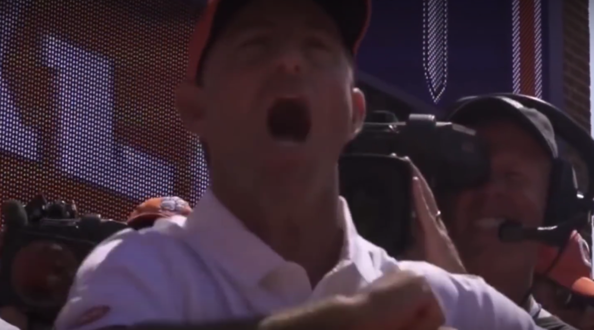 Clemson coach Dabo Swinney yelling with his mouth wide open.