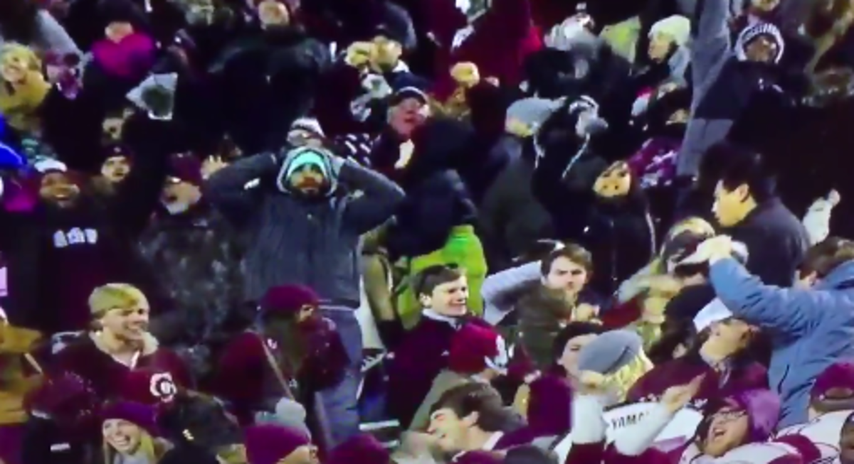 Arkansas fans get into a fight in game against Mississippi State.