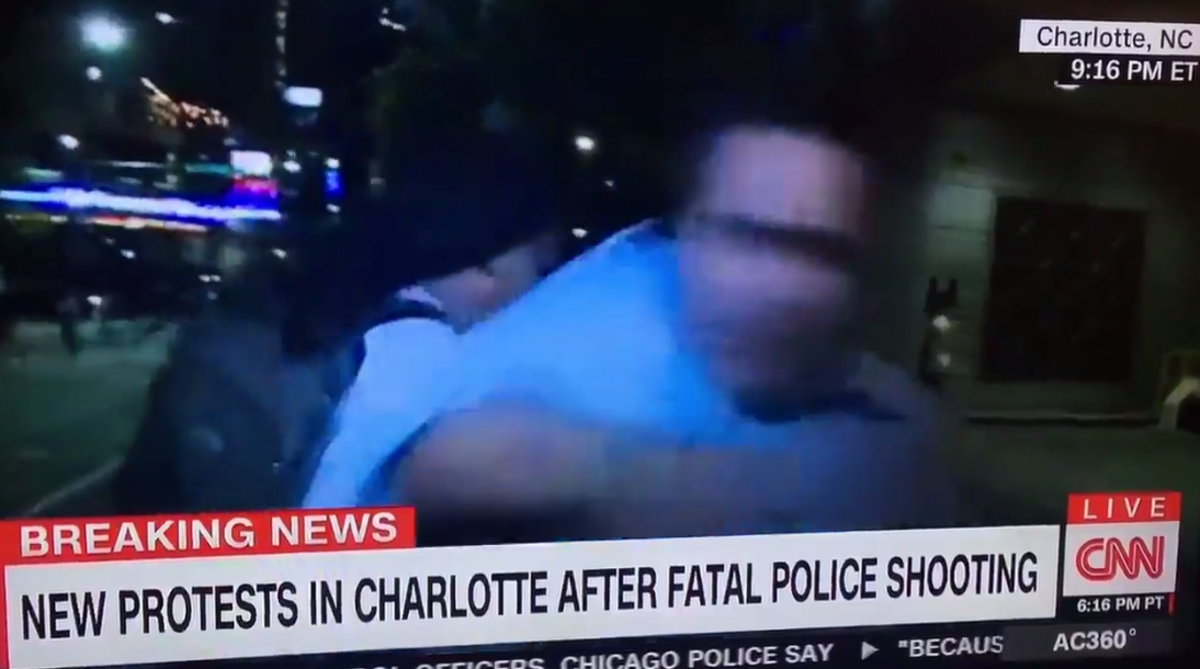 CNN Reporter during a protest in Charlotte.