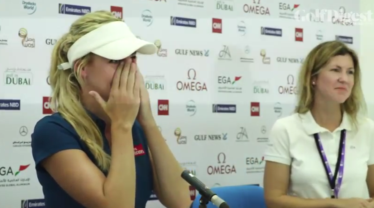 Paige Spiranac crying at an event.