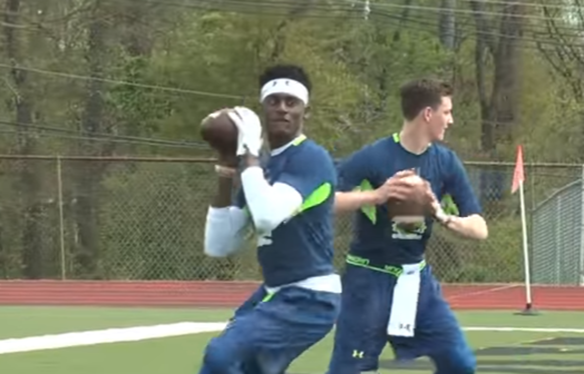 C.J. Lewis throwing the ball as a recruit.