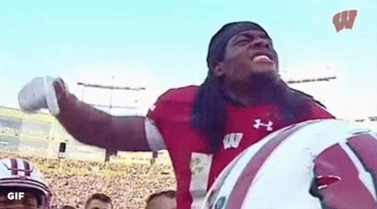 Wisconsin football player celebrates after beating Nebraska.