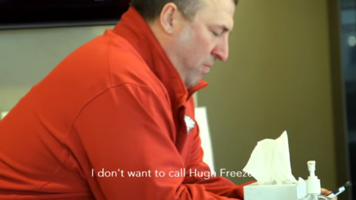 Bret Bielema on the phone during recruiting.