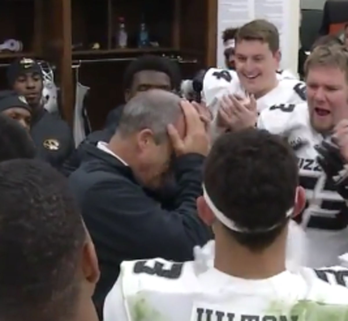 Gary Pinkel gets emotional in the Missouri locker room.