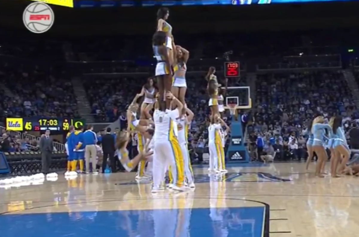 A UCLA cheerleader fell twice but it looks like she is okay.