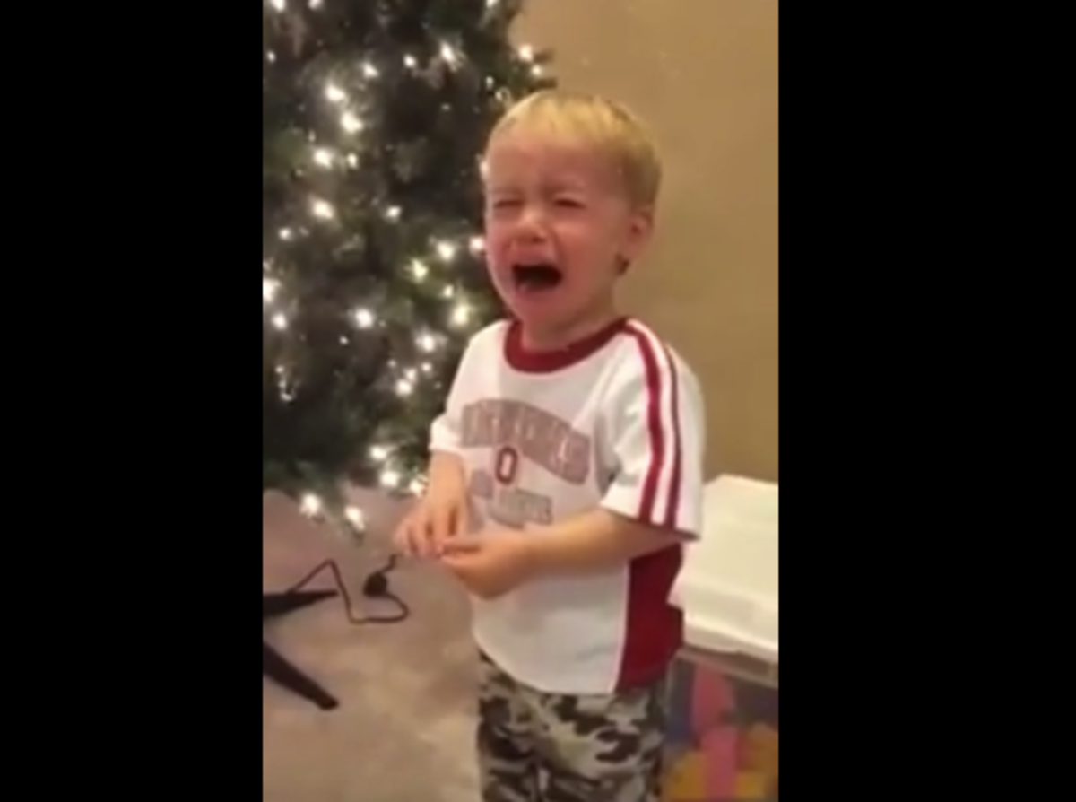 An Ohio State fan toddler cries about Michigan.