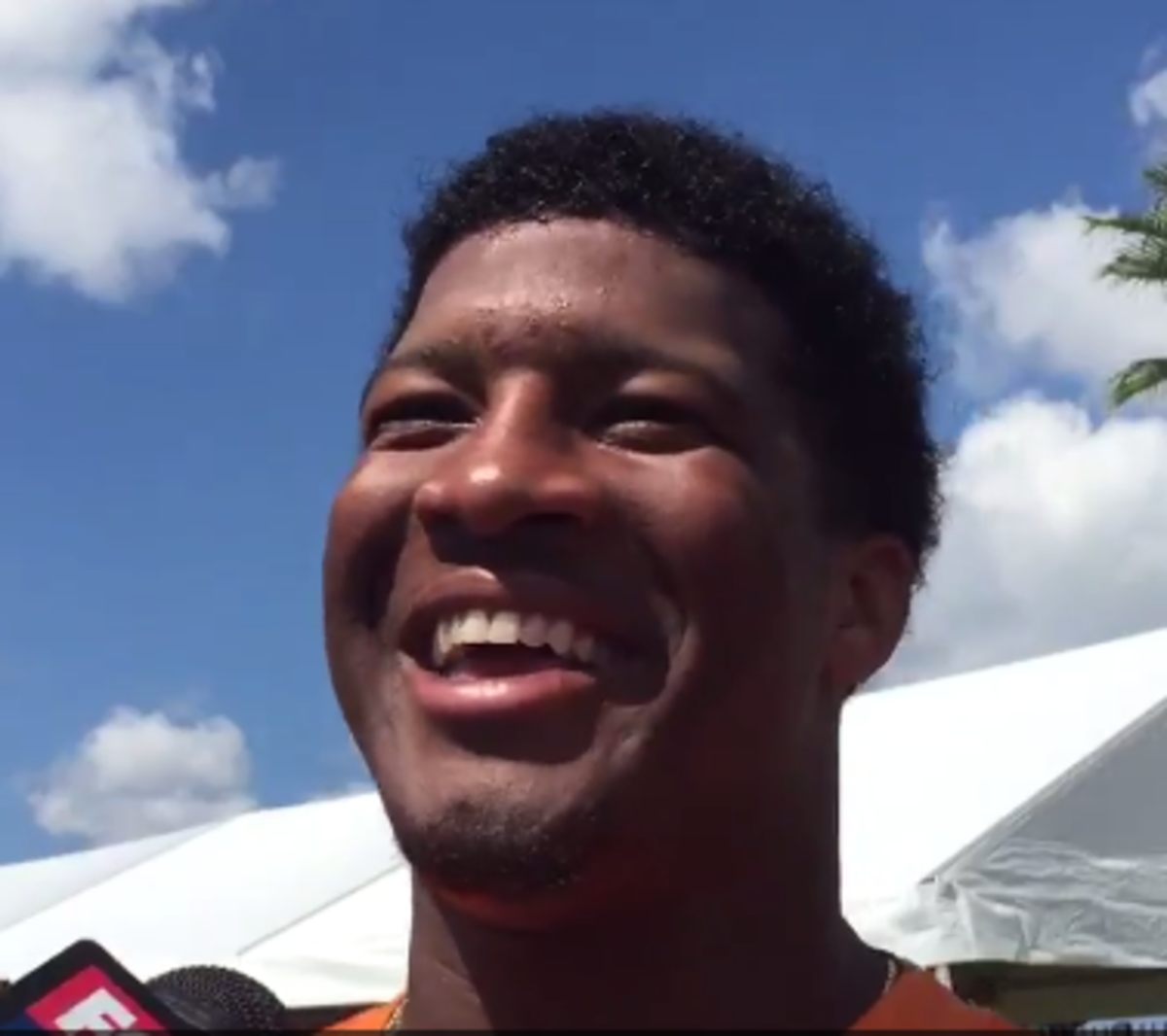 Jameis Winston laughs during an interview.