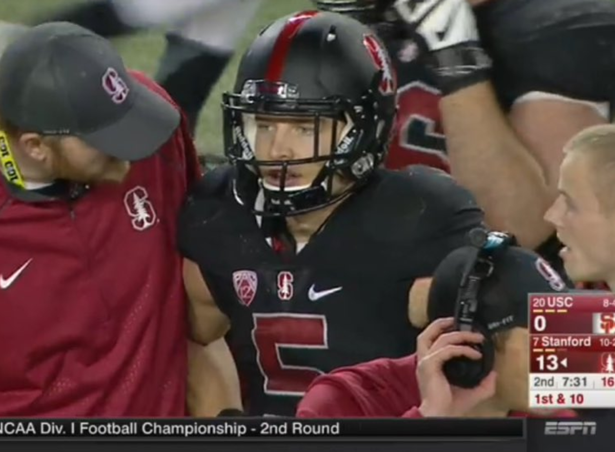Stanford's Christian McCaffrey coming off the field after breaking Barry Sander's total yardage record.