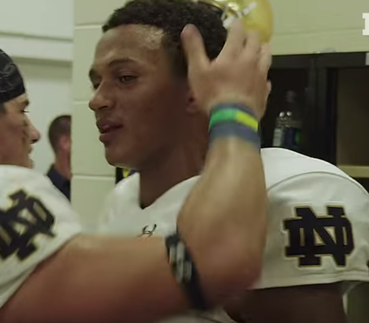 Deshone Kizer gets a pat on the head after Virginia game.