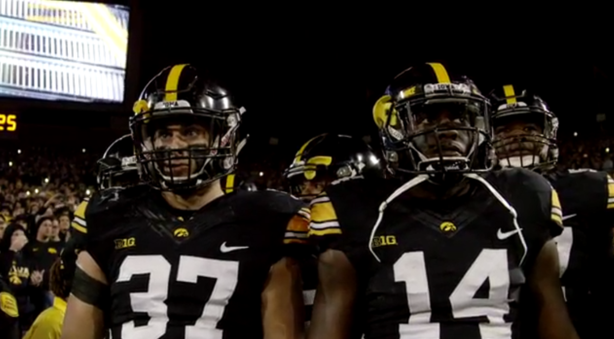 Iowa's players get ready to take the field.