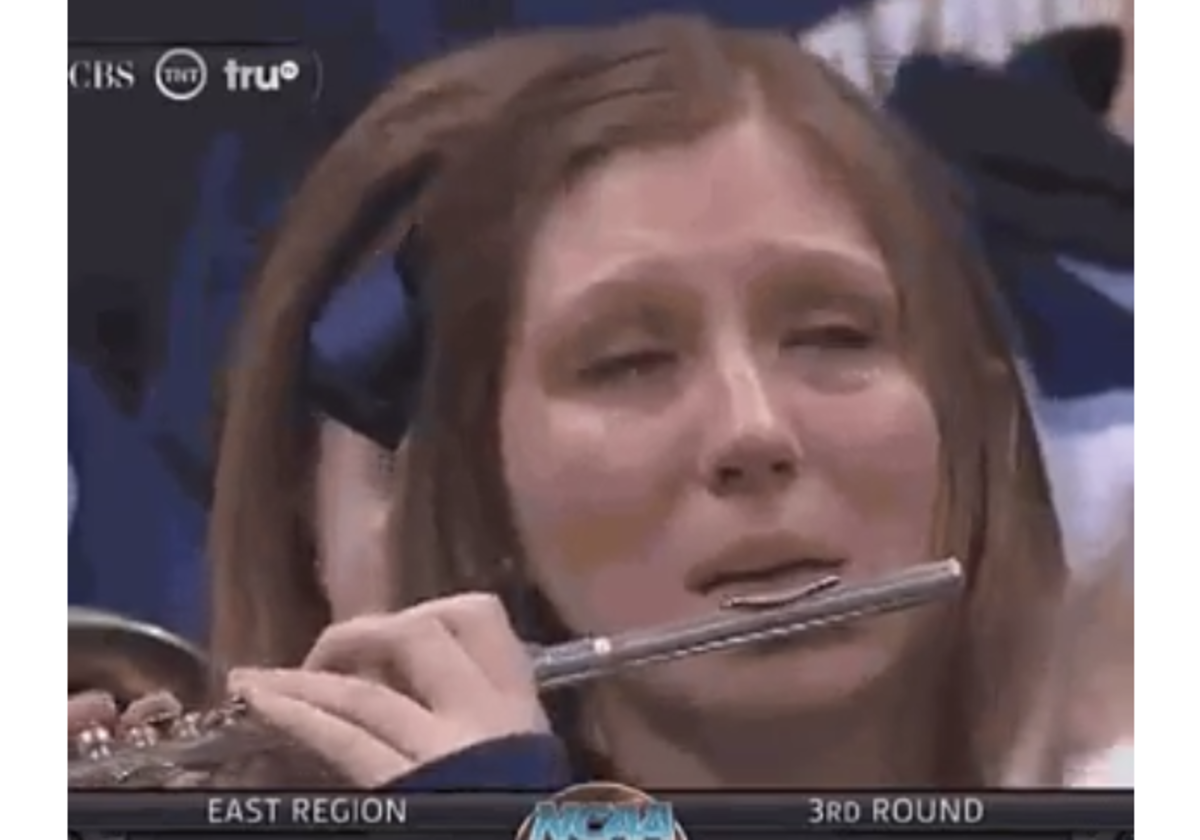 Villanova piccolo player crying after they lose to Wisconsin.