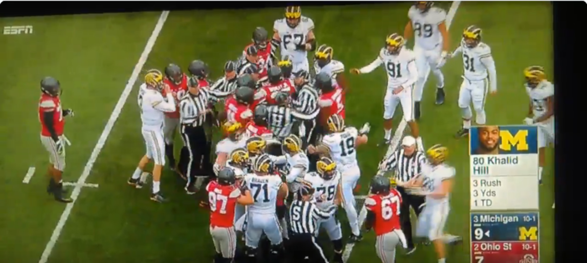 Ohio State and Michigan players brawl after a touchdown.