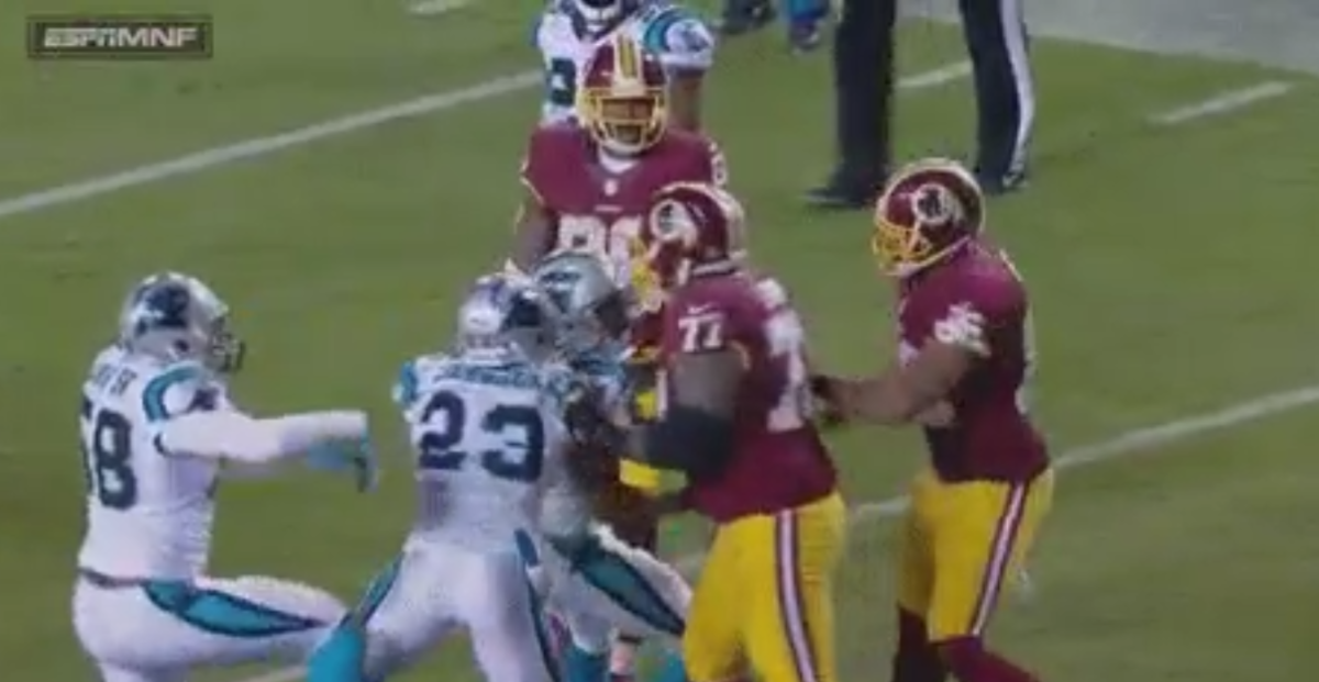 Jordan Reed punches an opponent.