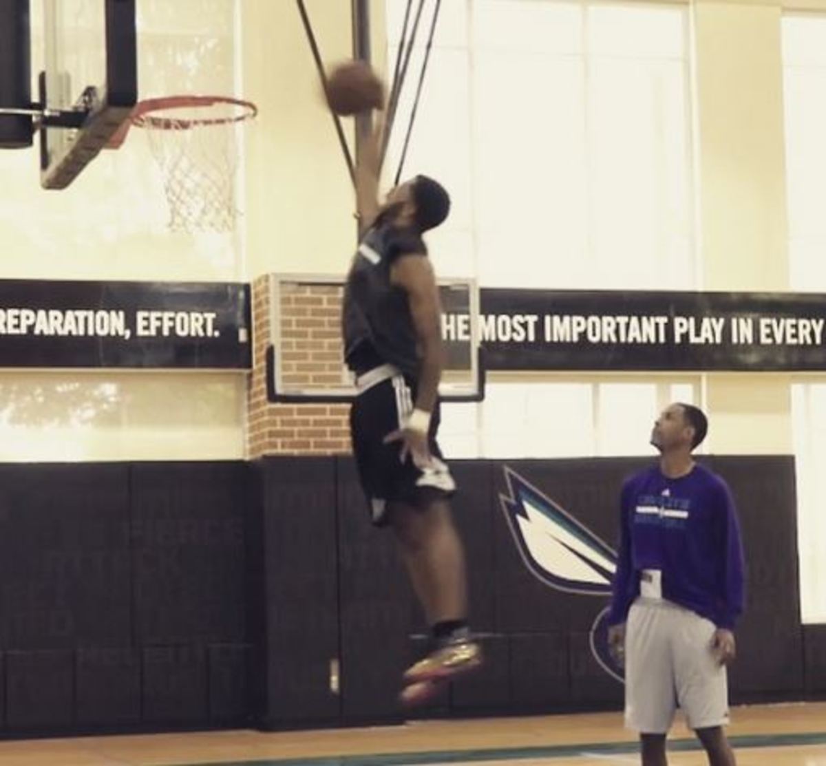 Kentucky's Andrew Harrison throws down a one handed dunk.