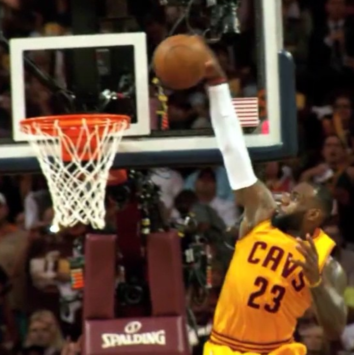 Lebron dunks throws down a one handed dunk.