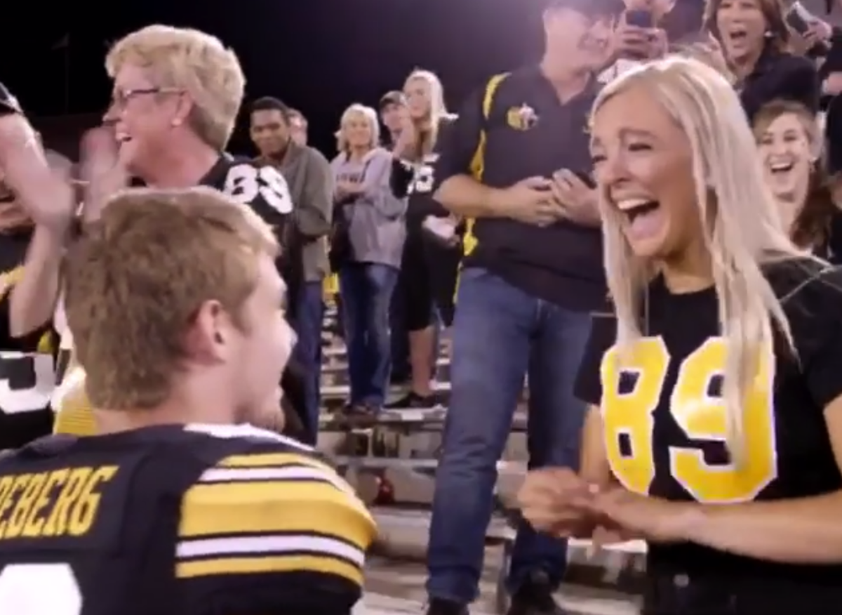 Matt VandeBerg proposing to his girlfriend after a win over Iowa State