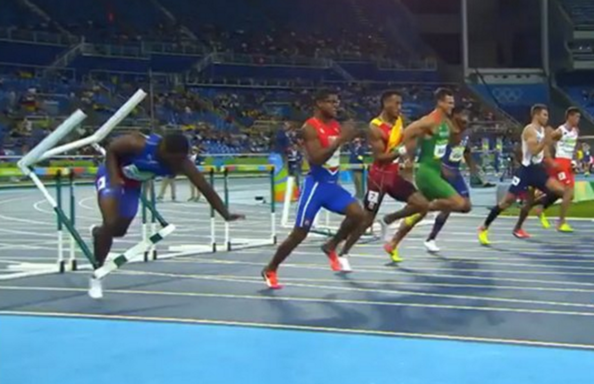 Olympic hurdler wipes out.