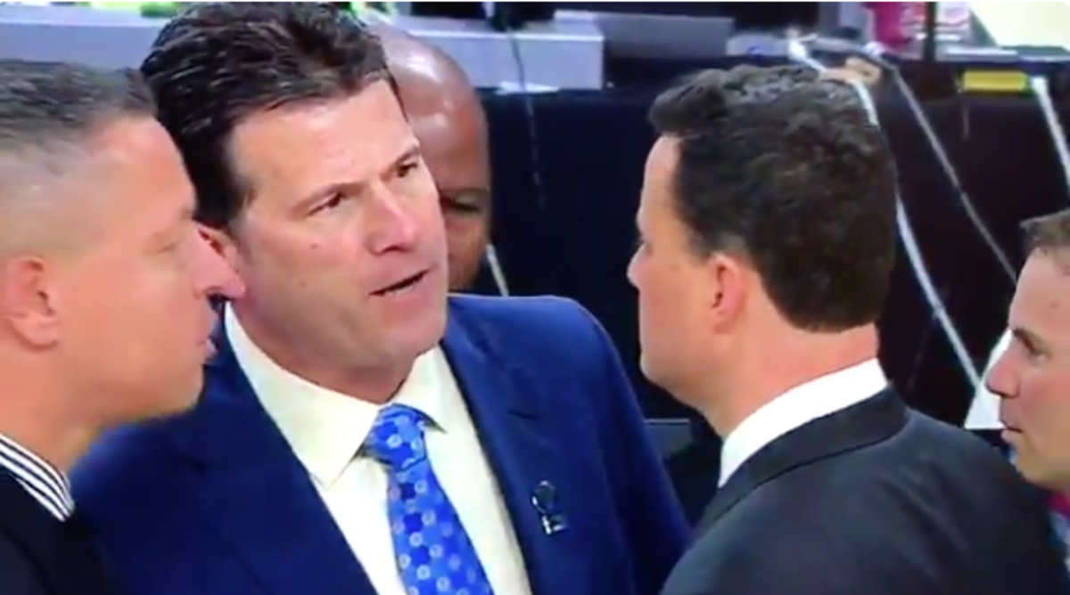 Sean Miller and Steve Alford come face to face in handshake line.
