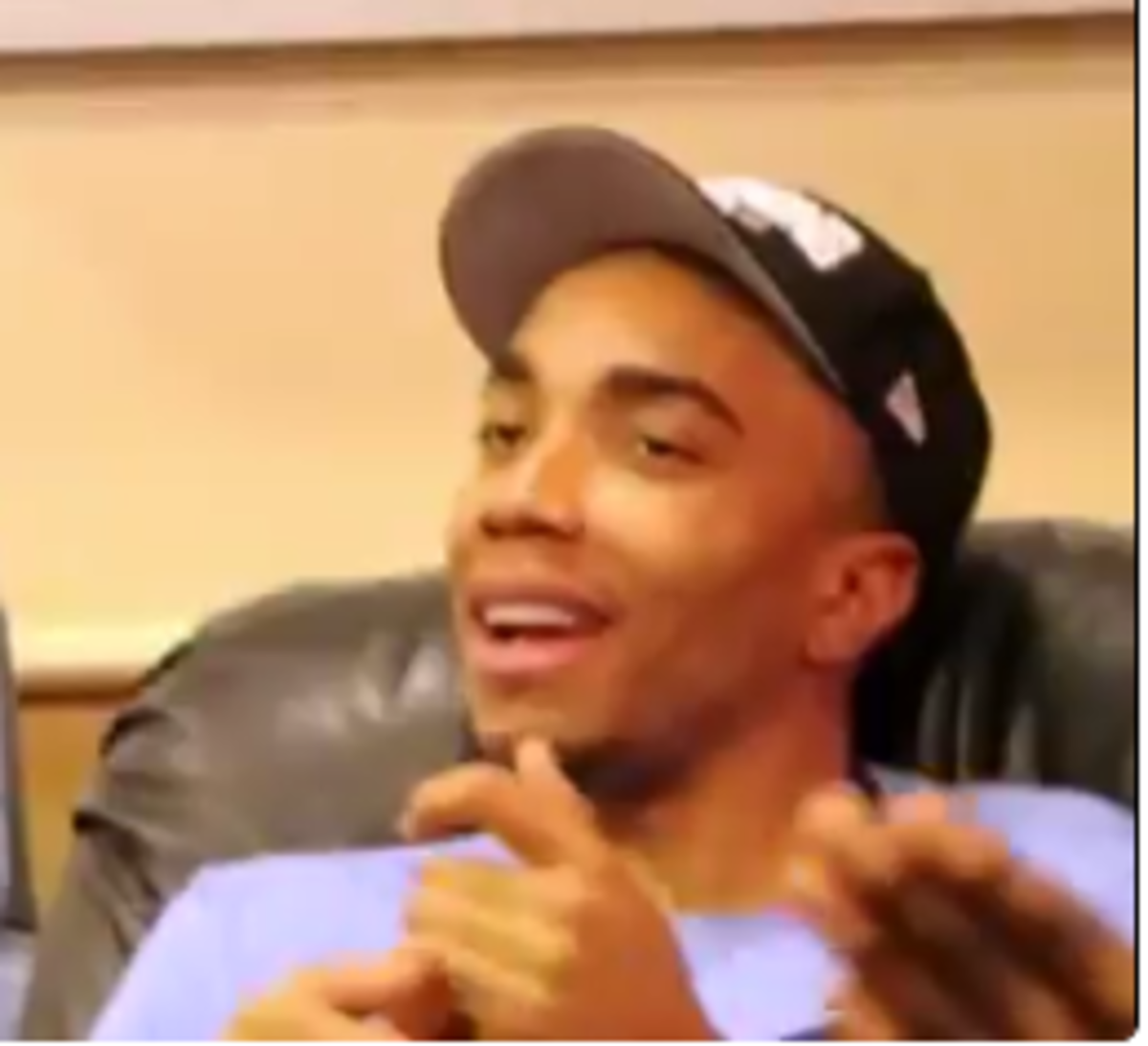 Brice Johnson on the couch finds out about All American selection and jersey honor.