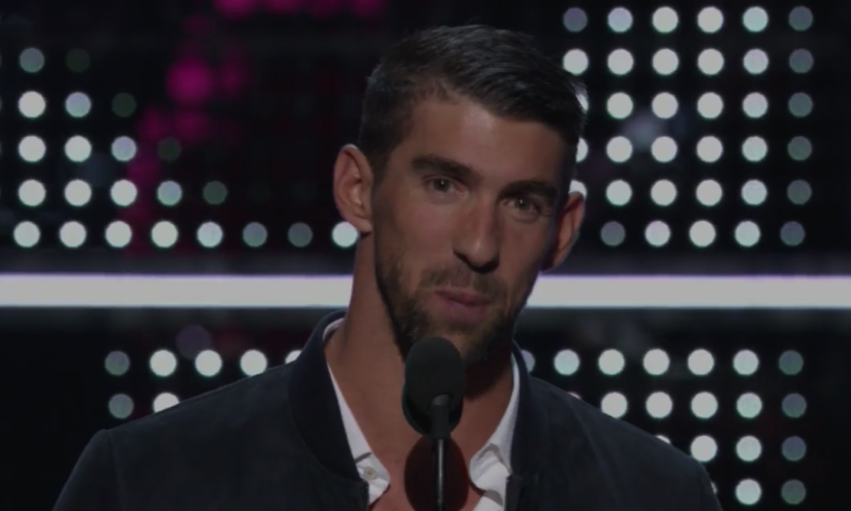 Michael Phelps speaking at award show.