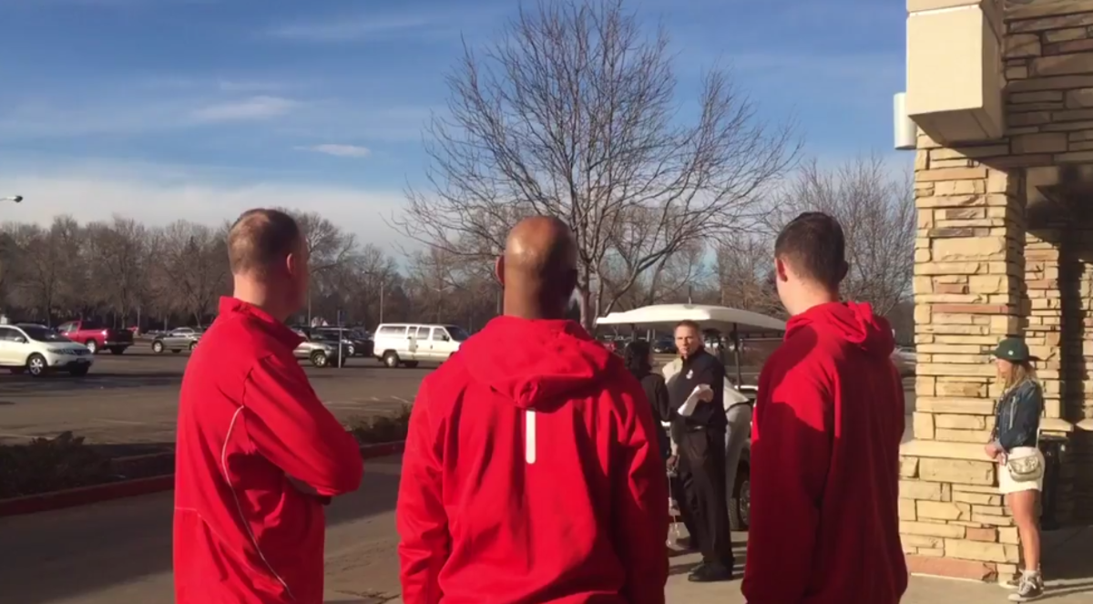 New Mexico and Colorado State coaches yell at each other after a game.