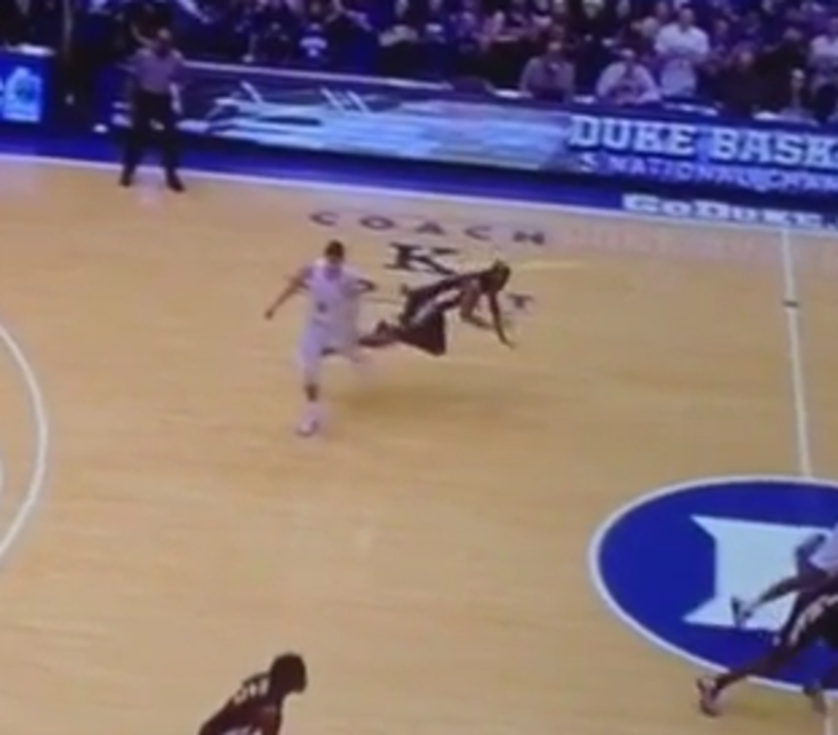 Grayson Allen trips an opponent during a game.