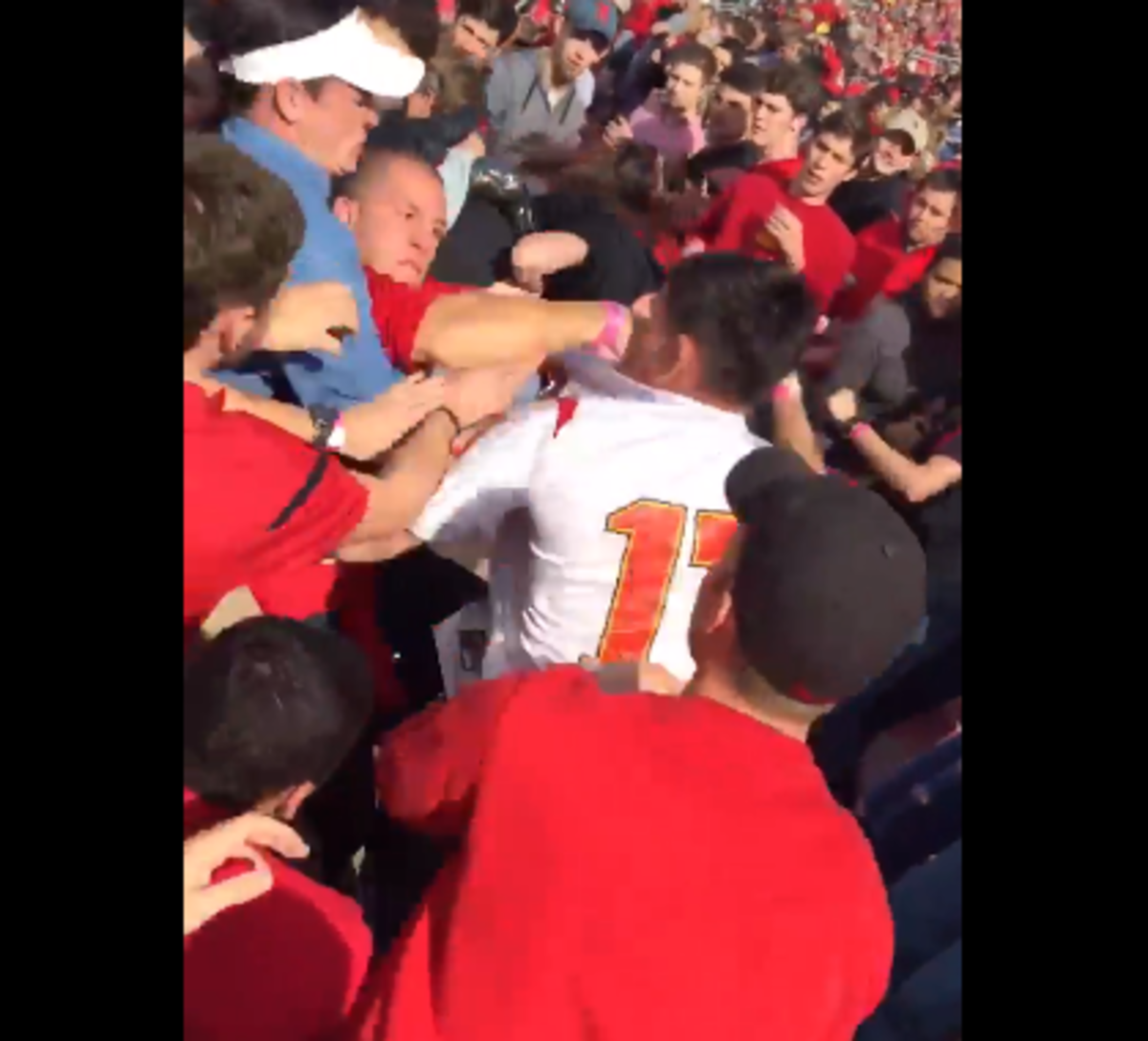 A fight breaks out in the Louisville stands.