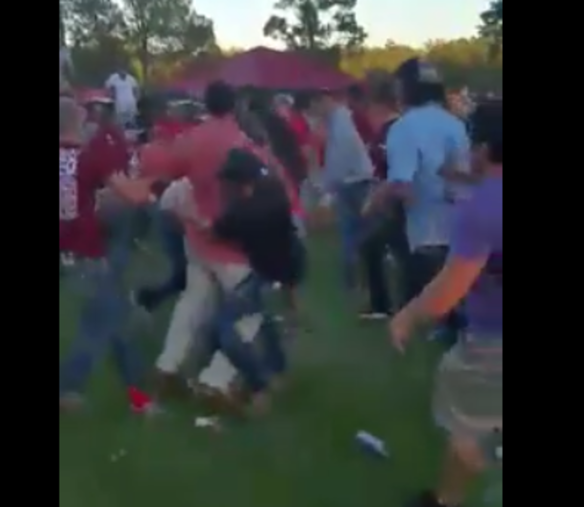 Arkansas fans brawling after loss to Toledo.