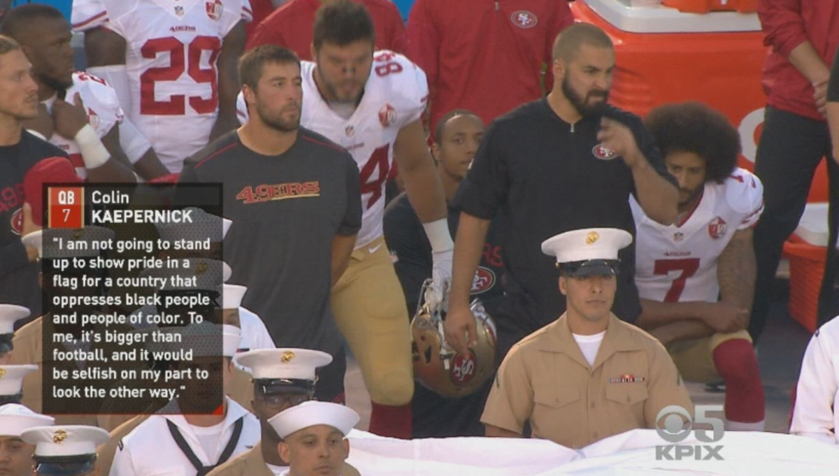 Eric Reid and Colin Kaepernick kneeling during the National Anthem.