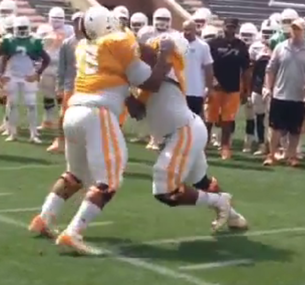 two lineman make contact in Tennessee circle drill.