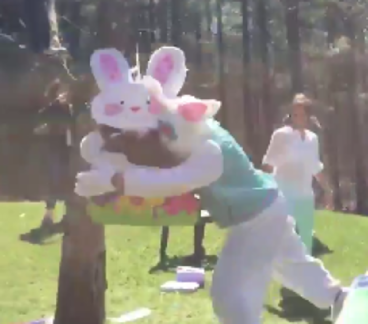 James Franklin wears a bunny costume while tackling a piñata.