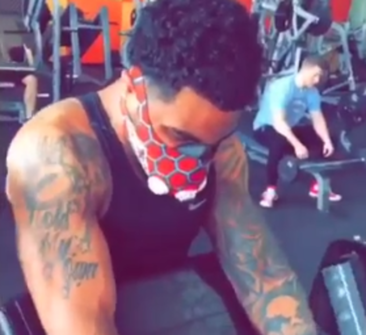 Braxton Miller works out in Bane-style mask.