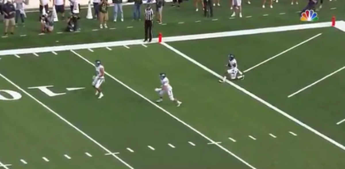 Nevada player accidentally gets a safety on a kick return
