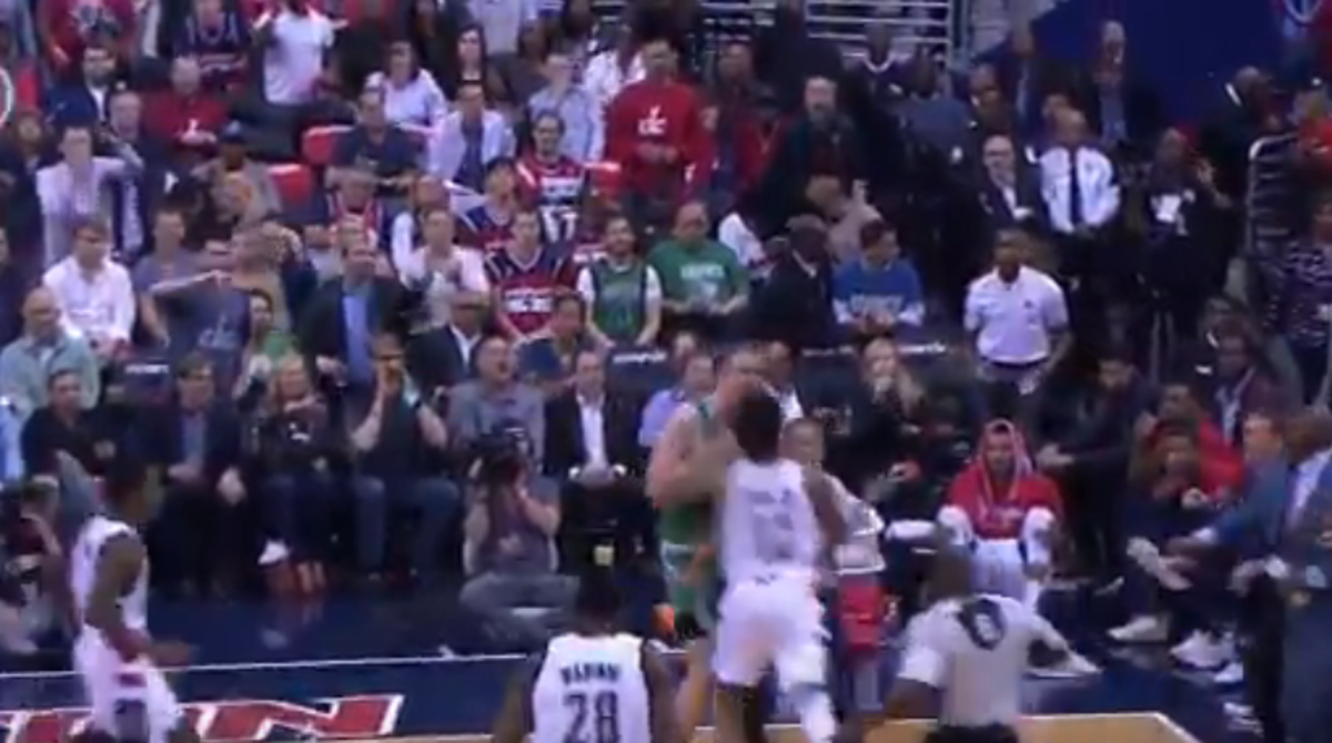 The Celtics and Wizards fighting.