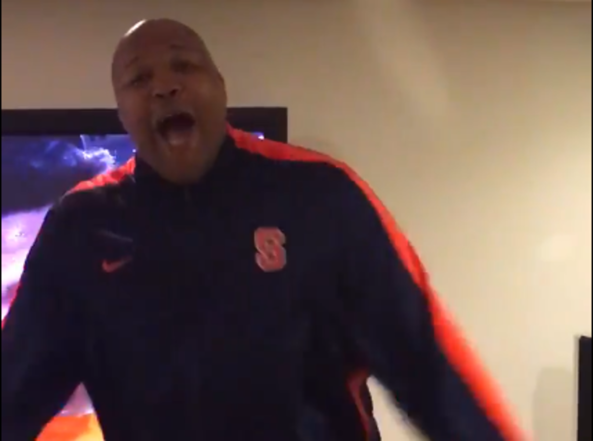 Derrick Coleman celebrates a Syracuse win in his living room.