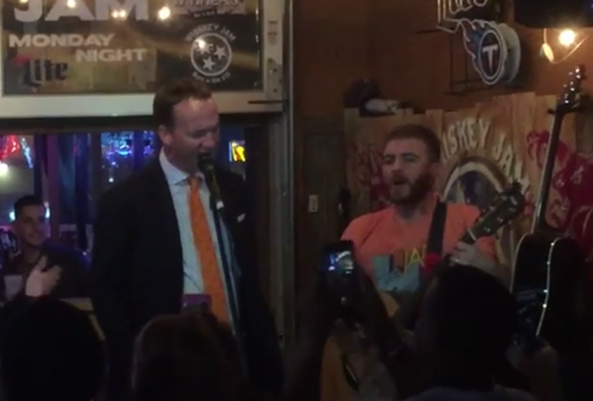 Peyton Manning gets on stage at Nashville Bar.