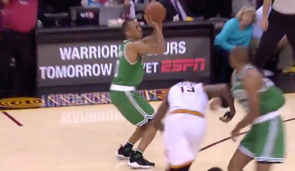 Avery Bradley attempts a three-pointer.