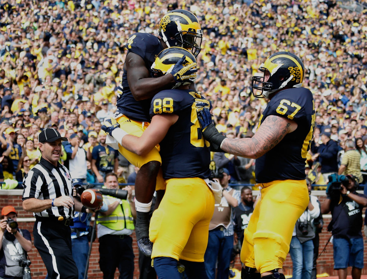 Michigan Wolverines celebrating a touchdown.