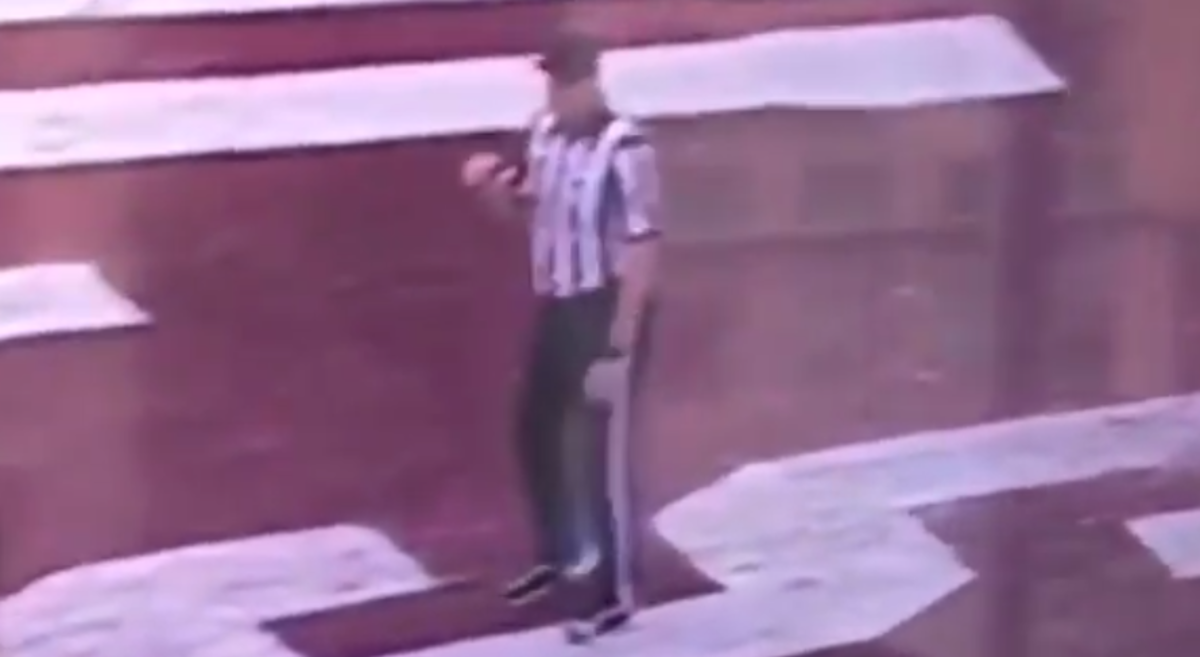 A referee fist-pumped after a Mississippi State touchdown.